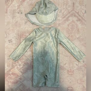 H&M baby swim - green sea shells. Never worn. Size 9-12 months